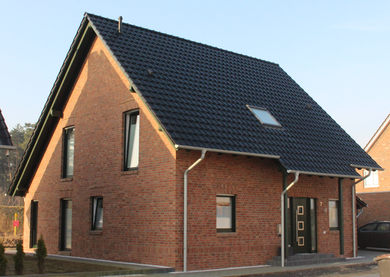 Holzhaus mit Klinkerfassade